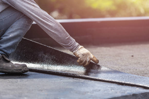 Professional Basement Waterproofing technician working in Galveston, IN